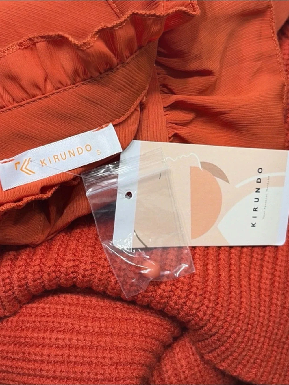 Ruffled Knit Turtleneck Sweater in Orange